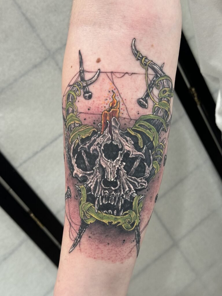 colorful tattoo skull with candle tattoo done by Mangesh rane