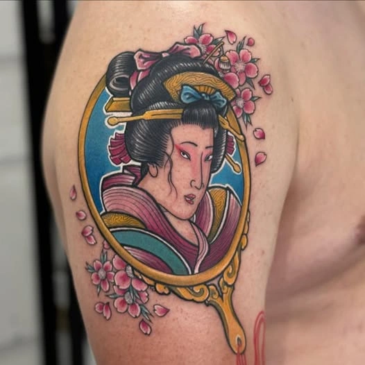 colorful japanese tattoo geisha with mirror and sakura flowers done by mangesh rane